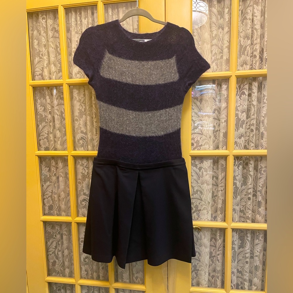 Adorable knit tennis dress from sportmax code. Knit top. Pleated bottom.